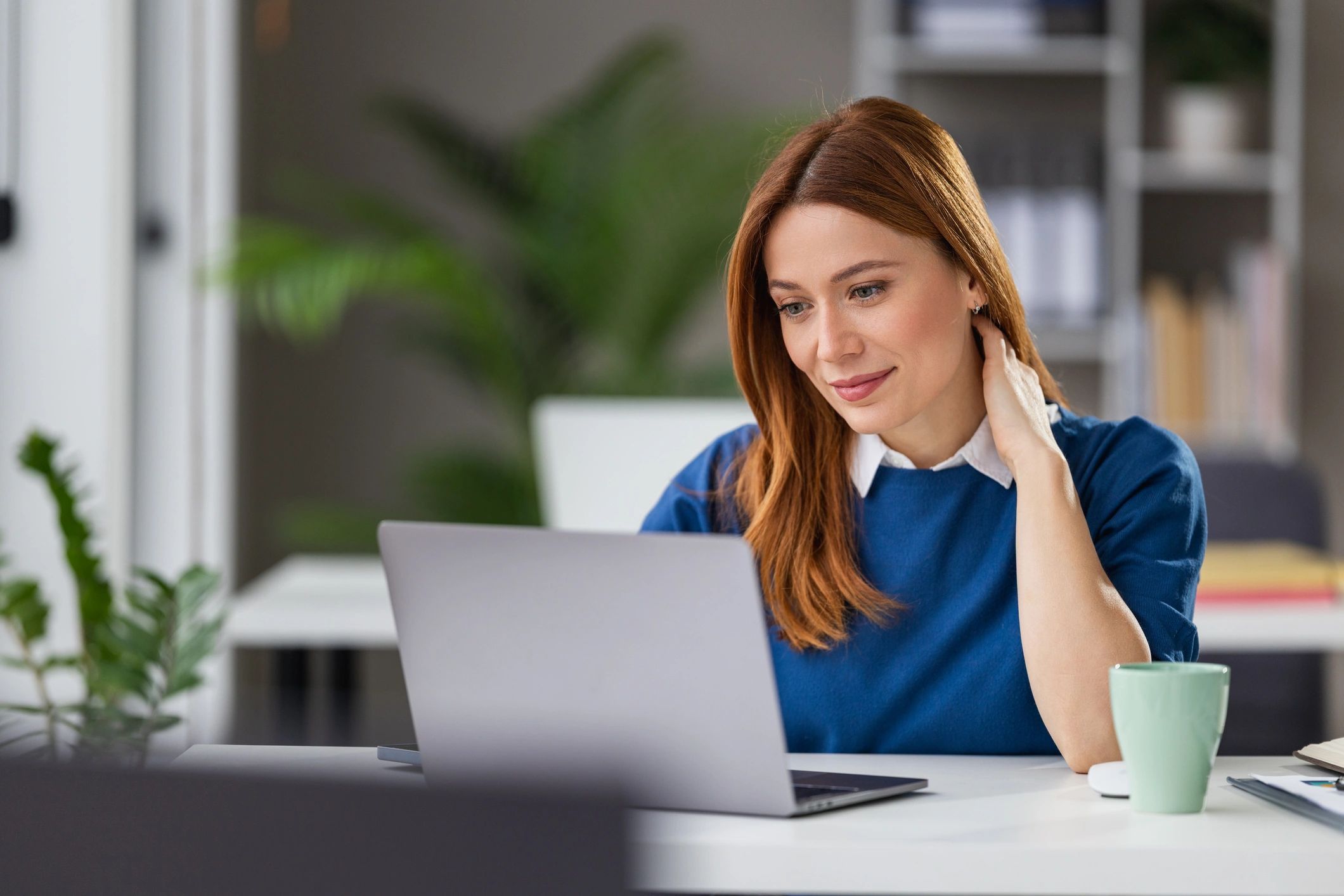 Virtual assistant working professionally on a laptop
